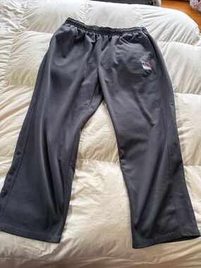 NHL Men's Charcoal Gray Sweatpants with Small Team Crest